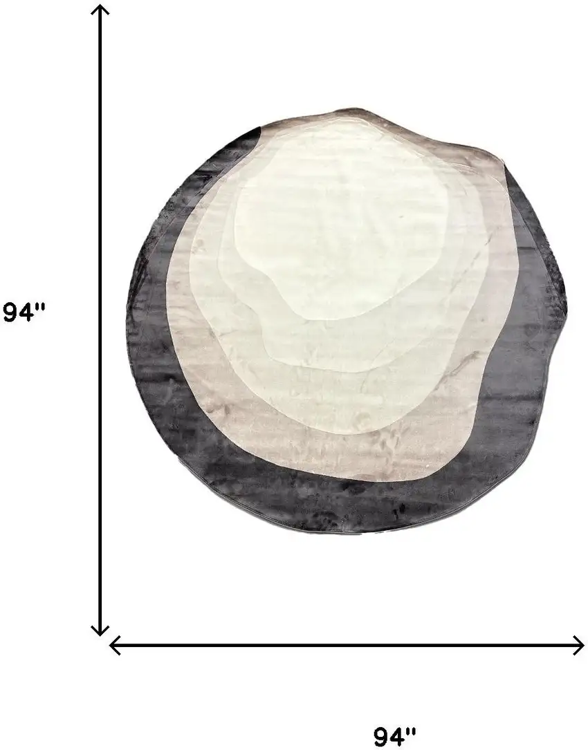 7' Black And Cream Abstract Round Rug Photo 6