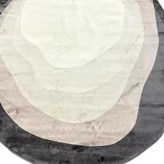 7' Black And Cream Abstract Round Rug Photo 4