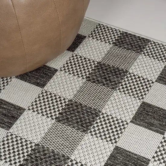 8' Black And Cream Geometric Indoor Outdoor Runner Rug Photo 7