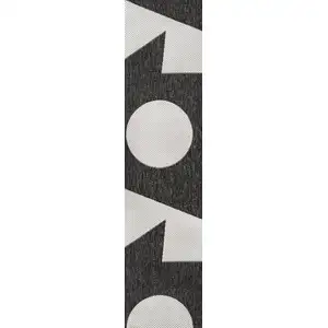 Photo of 8' Black And Cream Geometric Indoor Outdoor Runner Rug