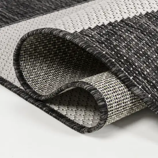 8' Black And Cream Geometric Indoor Outdoor Runner Rug Photo 8