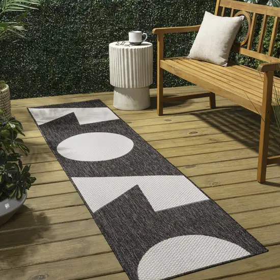 8' Black And Cream Geometric Indoor Outdoor Runner Rug Photo 5