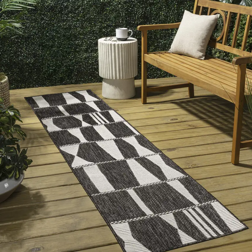8' Black And Cream Geometric Indoor Outdoor Runner Rug Photo 5