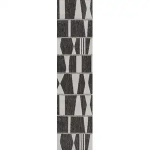 Photo of 8' Black And Cream Geometric Indoor Outdoor Runner Rug