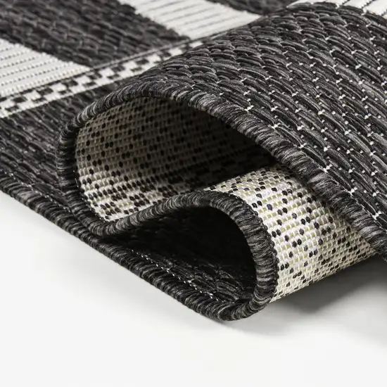8' Black And Cream Geometric Indoor Outdoor Runner Rug Photo 8