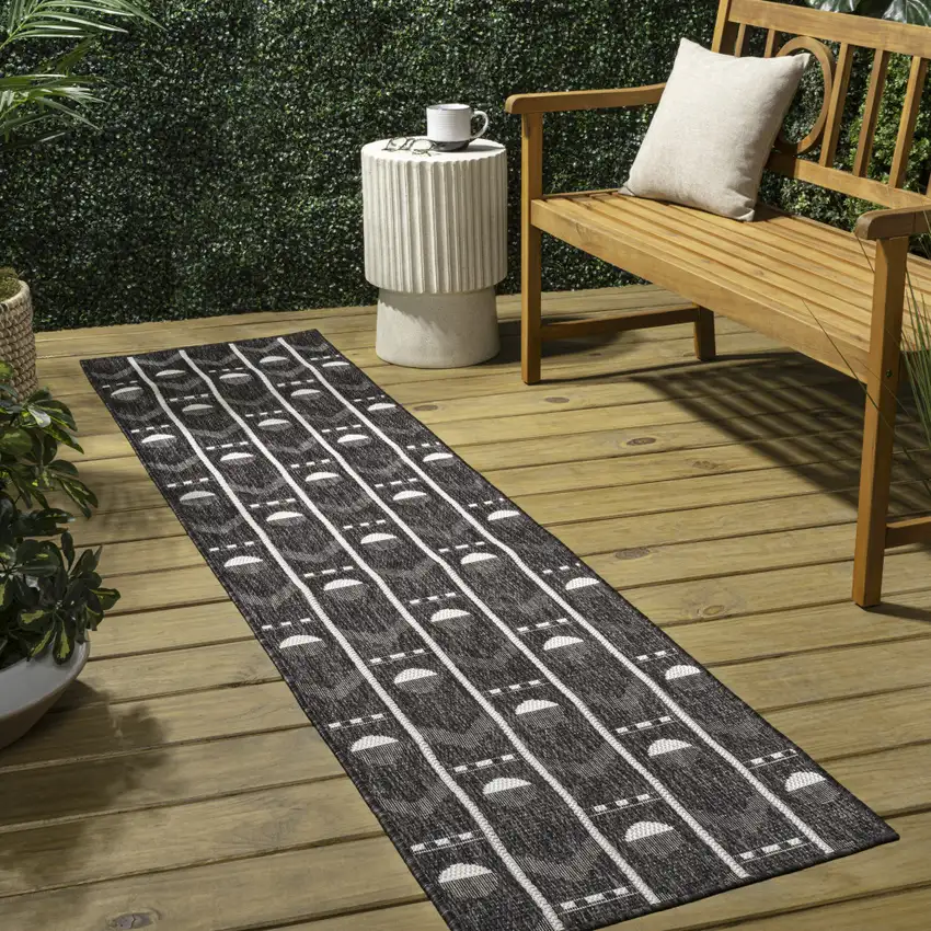 8' Black And Cream Geometric Indoor Outdoor Runner Rug Photo 4