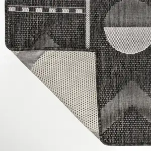 Photo of 8' Black And Cream Geometric Indoor Outdoor Runner Rug