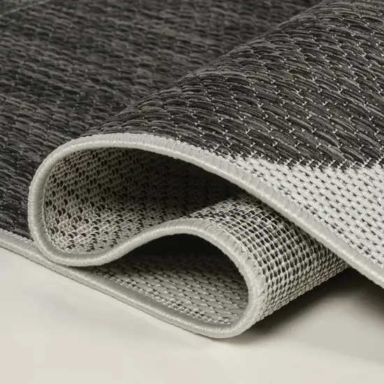 8' Black And Cream Geometric Indoor Outdoor Runner Rug Photo 8