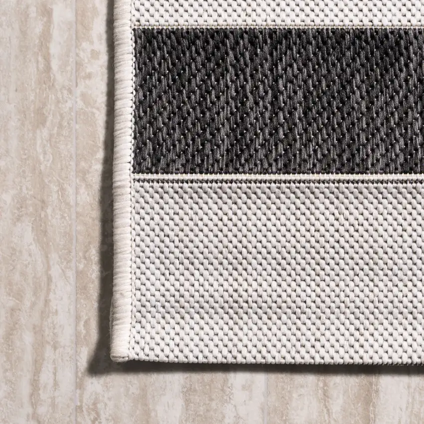 5' Black And Cream Round Striped Indoor Outdoor Area Rug Photo 9