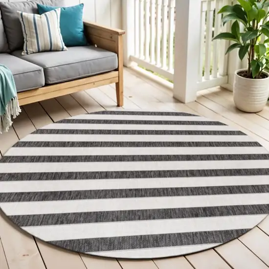 6' Black And Cream Round Striped Indoor Outdoor Area Rug Photo 1