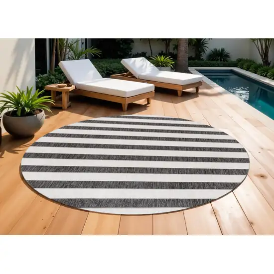 9' Black And Cream Round Striped Indoor Outdoor Area Rug Photo 1