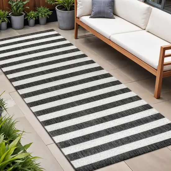 8' Black And Cream Striped Indoor Outdoor Runner Rug Photo 1