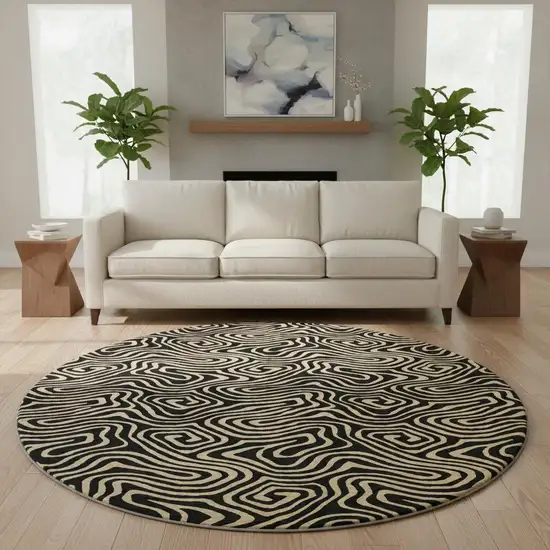 8' Black And Gold Abstract Washable Round Rug With UV Protection Photo 2
