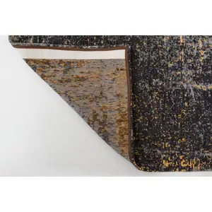 Photo of 8' Black And Gold Chevron Washable Round Rug