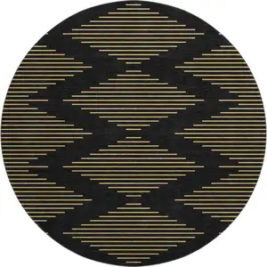 Photo of 8' Black And Gold Geometric Washable Round Rug With UV Protection