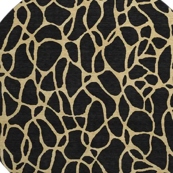 8' Black And Gold Geometric Washable Round Rug With UV Protection Photo 2