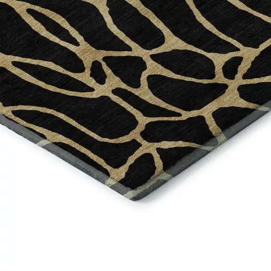 8' Black And Gold Geometric Washable Round Rug With UV Protection Photo 6