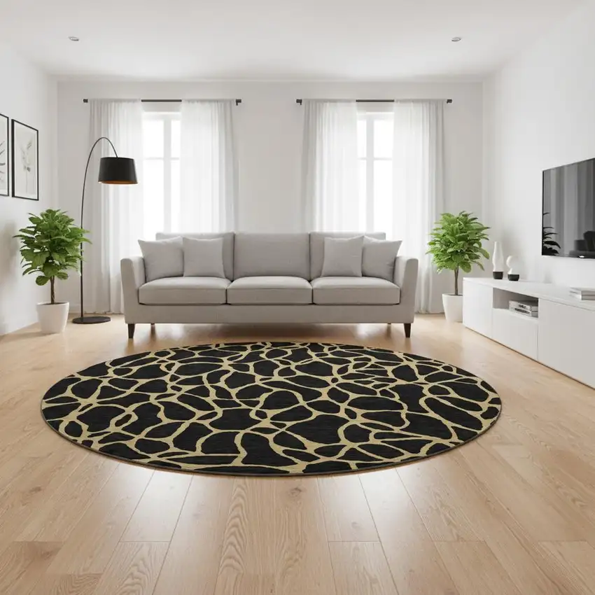 8' Black And Gold Geometric Washable Round Rug With UV Protection Photo 2