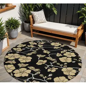 Photo of 8' Black And Gold Round Floral Washable Indoor Outdoor Area Rug