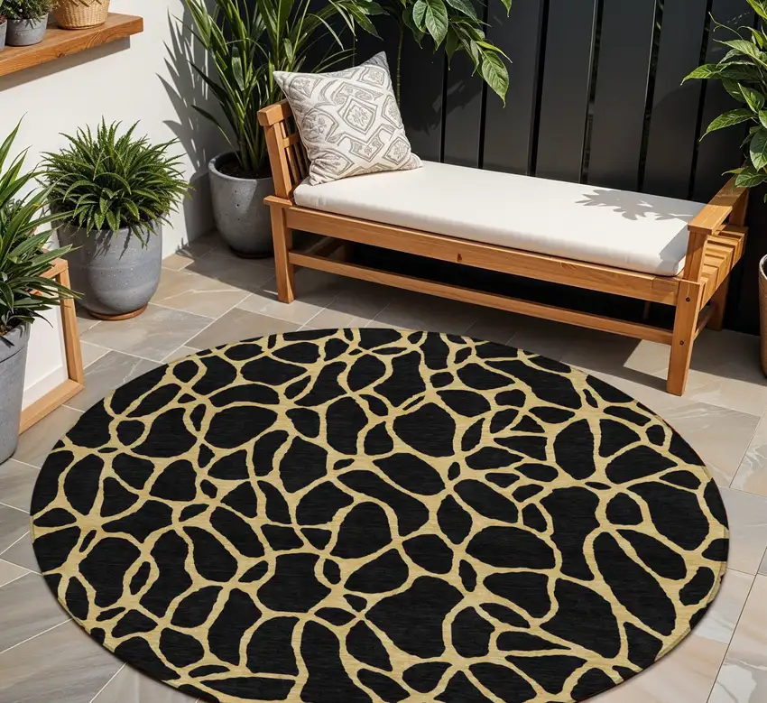 8' Black And Gold Round Geometric Washable Indoor Outdoor Area Rug Photo 1