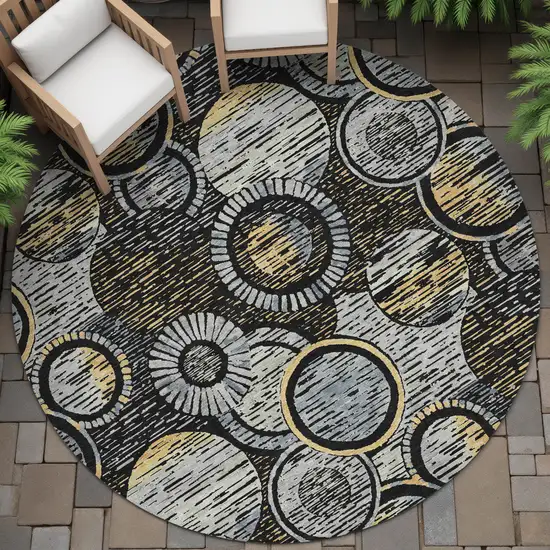 8' Black And Gold Round Geometric Washable Indoor Outdoor Area Rug Photo 7