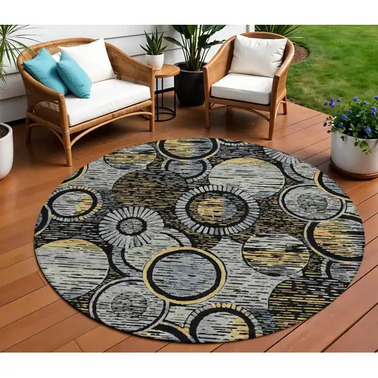 8' Black And Gold Round Geometric Washable Indoor Outdoor Area Rug Photo 2