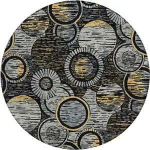 Photo of 8' Black And Gold Round Geometric Washable Indoor Outdoor Area Rug
