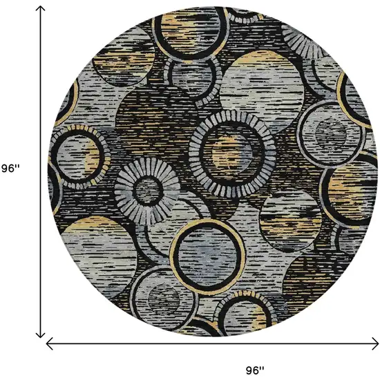 8' Black And Gold Round Geometric Washable Indoor Outdoor Area Rug Photo 9