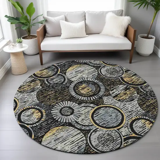 8' Black And Gold Round Geometric Washable Indoor Outdoor Area Rug Photo 8