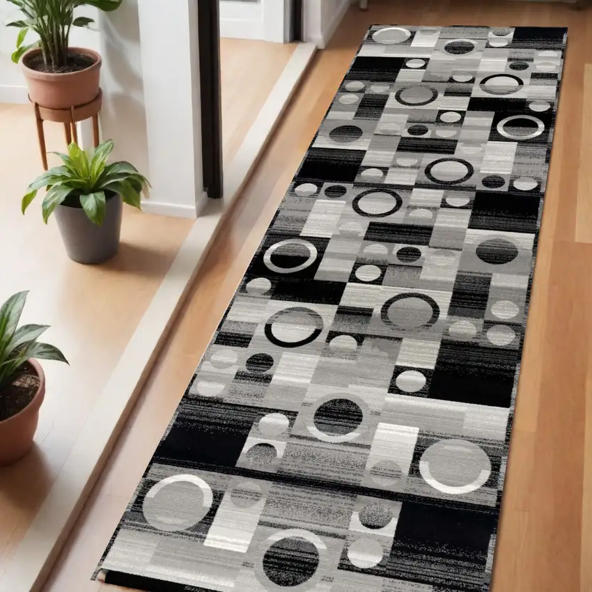 6' Black And Gray Geometric Runner Rug Photo 1
