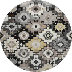 Photo of 8' Black And Gray Geometric Washable Round Rug With UV Protection