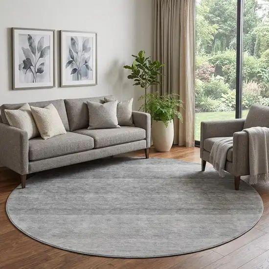 8' Black And Gray Ombre Washable Round Rug With UV Protection Photo 1