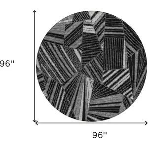 Photo of 8' Black And Gray Round Geometric Washable Indoor Outdoor Area Rug