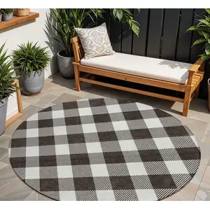 Photo of 8' Black And Gray Round Plaid Washable Indoor Outdoor Area Rug