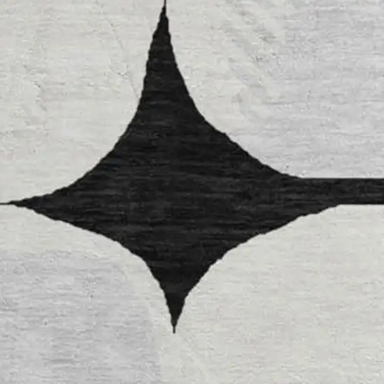 8' Black And Ivory Abstract Geometric Washable Round Rug With UV Protection Photo 4