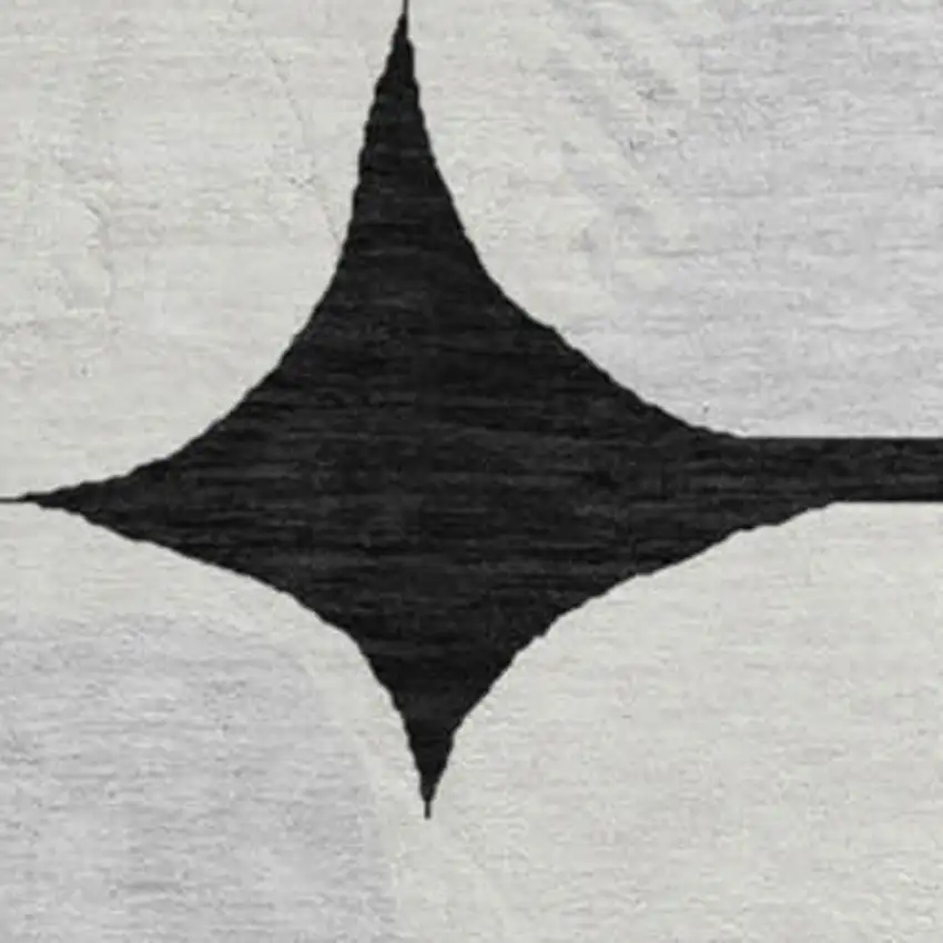 8' Black And Ivory Abstract Geometric Washable Round Rug With UV Protection Photo 4