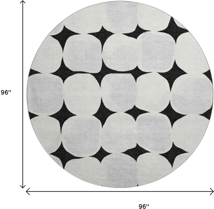 8' Black And Ivory Abstract Geometric Washable Round Rug With UV Protection Photo 8