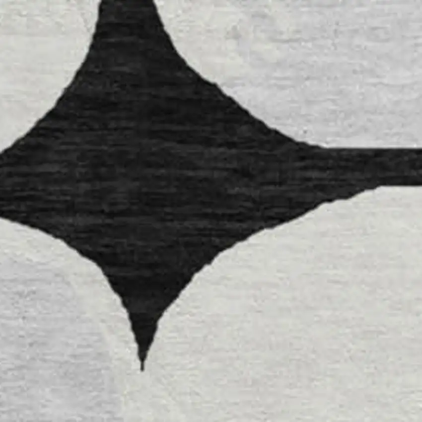 8' Black And Ivory Abstract Geometric Washable Round Rug With UV Protection Photo 3