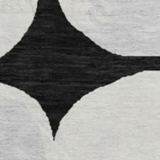 8' Black And Ivory Abstract Geometric Washable Round Rug With UV Protection Photo 3