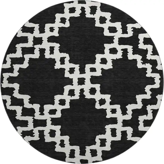 8' Black And Ivory Abstract Geometric Washable Round Rug With UV Protection Photo 1