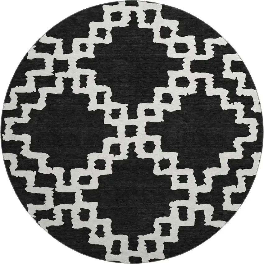 8' Black And Ivory Abstract Geometric Washable Round Rug With UV Protection Photo 1