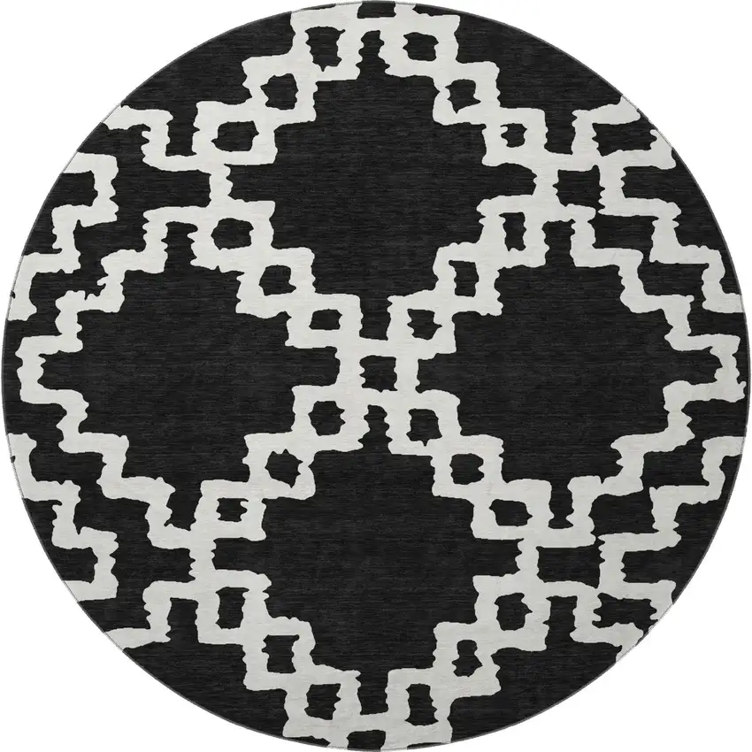 8' Black And Ivory Abstract Geometric Washable Round Rug With UV Protection Photo 4