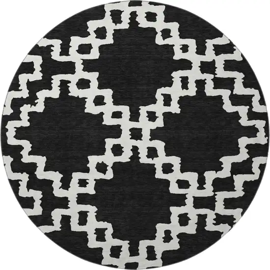 8' Black And Ivory Abstract Geometric Washable Round Rug With UV Protection Photo 4