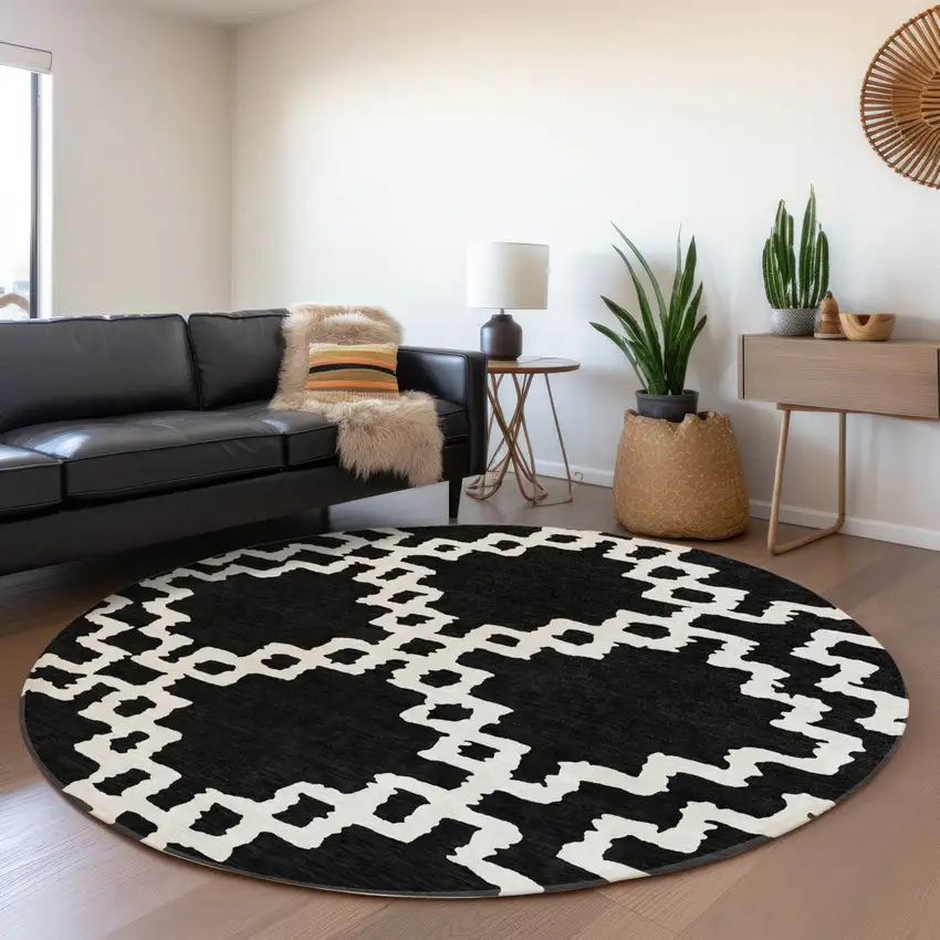 8' Black And Ivory Abstract Geometric Washable Round Rug With UV Protection Photo 5