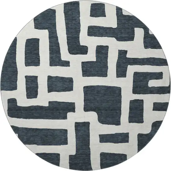 8' Black And Ivory Abstract Geometric Washable Round Rug With UV Protection Photo 3