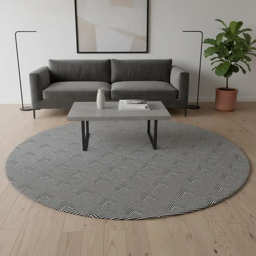 8' Black And Ivory Abstract Geometric Washable Round Rug With UV Protection Photo 2