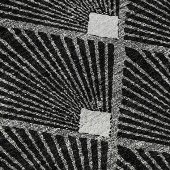 8' Black And Ivory Abstract Geometric Washable Round Rug With UV Protection Photo 9