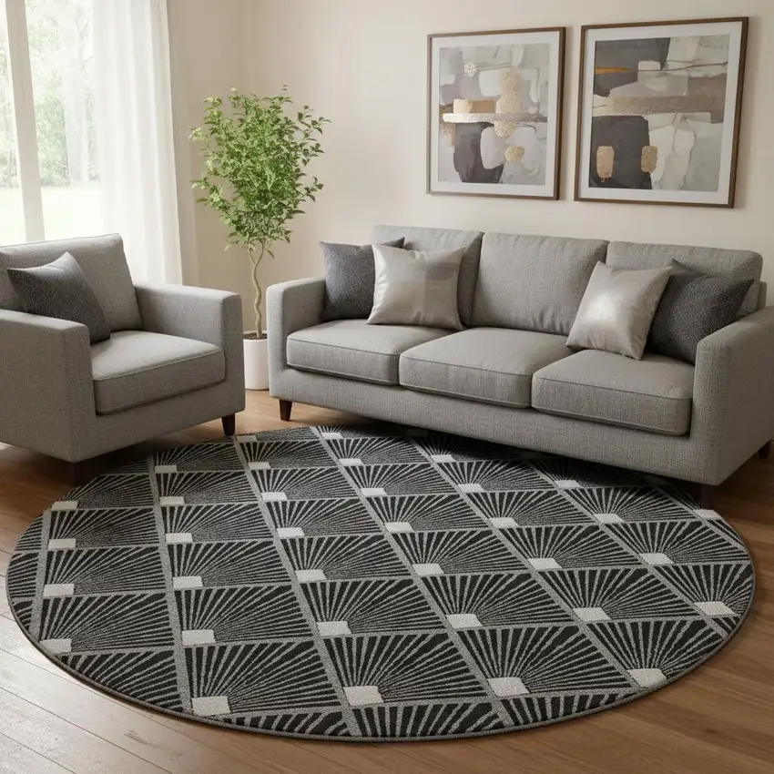 8' Black And Ivory Abstract Geometric Washable Round Rug With UV Protection Photo 1
