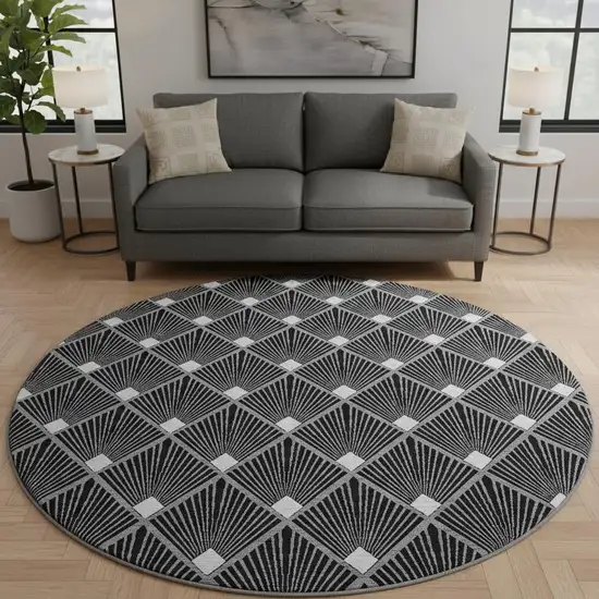 8' Black And Ivory Abstract Geometric Washable Round Rug With UV Protection Photo 2