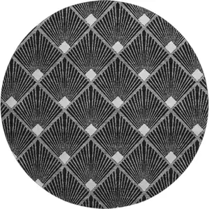 Photo of 8' Black And Ivory Abstract Geometric Washable Round Rug With UV Protection